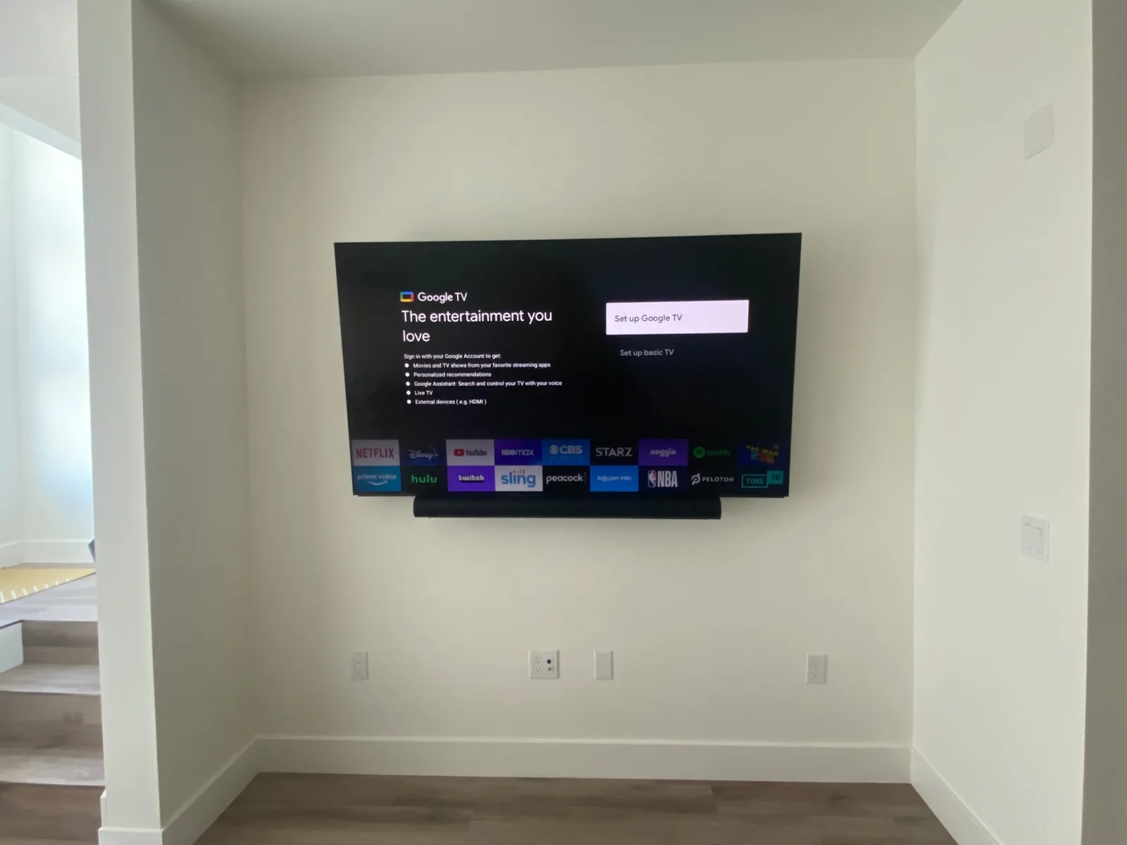 65″ Hisense Google TV with a soundbar mounted directly underneath in Gilroy, CA