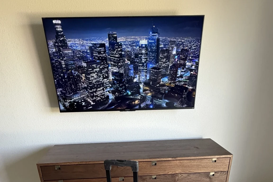 65-inch Sony TV wall-mounted with in-wall cable concealment in Hollister