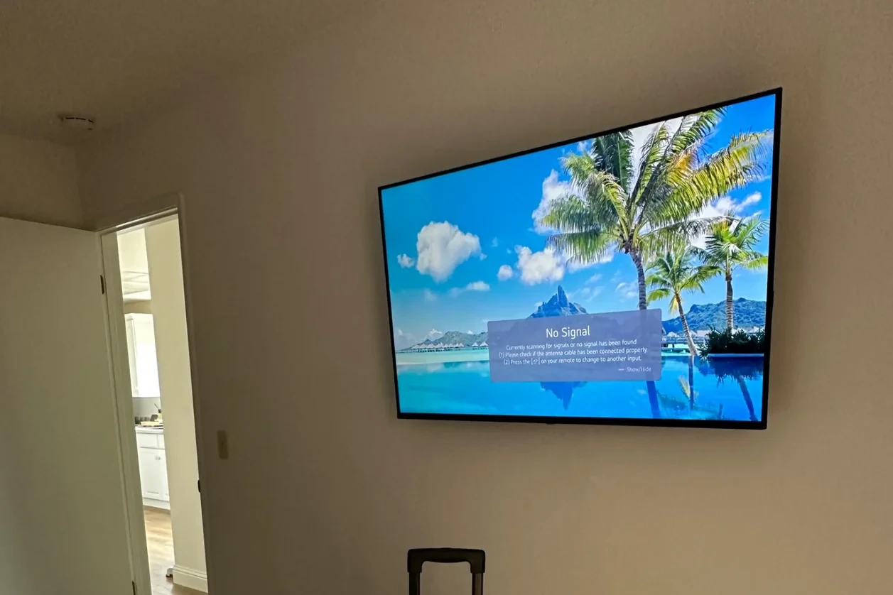 55-inch Samsung TV wall-mounted in Morgan Hill bedroom