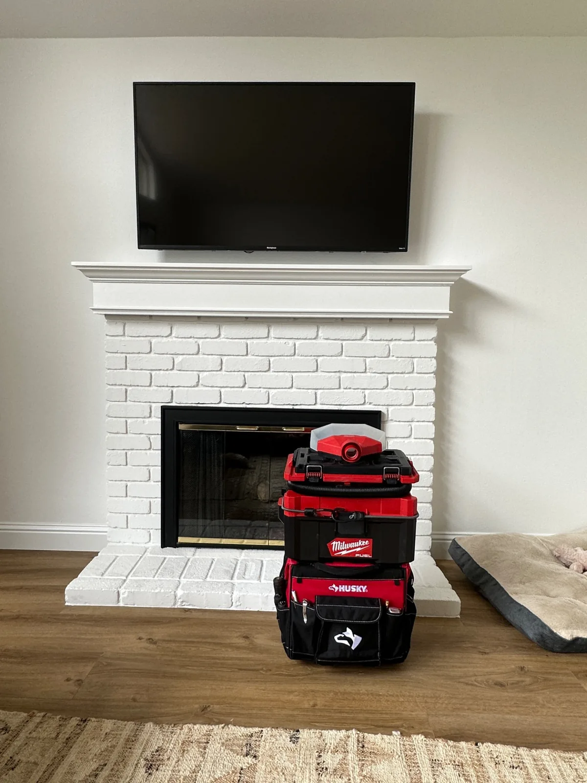 55-inch Westinghouse Roku TV mounted above a fireplace in Pacific Grove