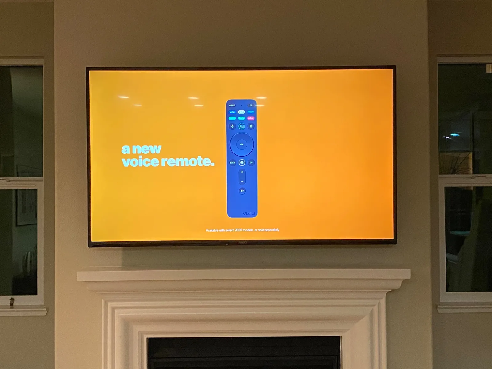 75-inch Vizio TV mounted over a fireplace in Pacific Grove