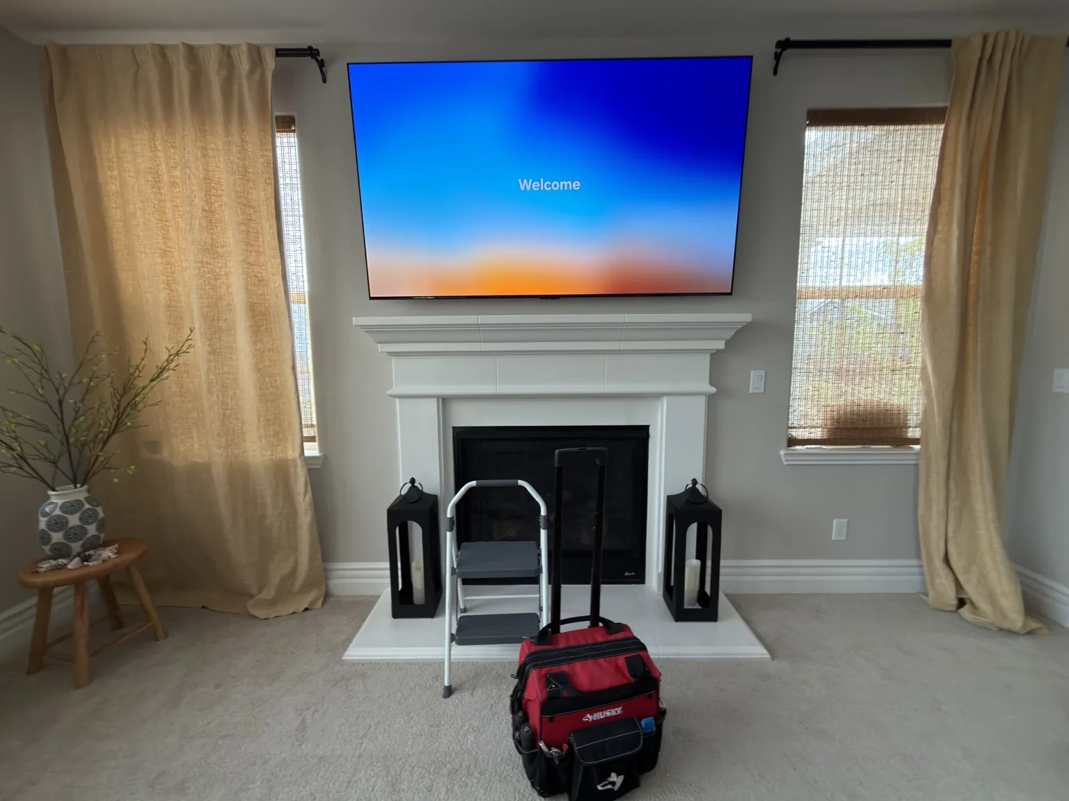 82-inch Samsung TV mounted over a fireplace in Salinas