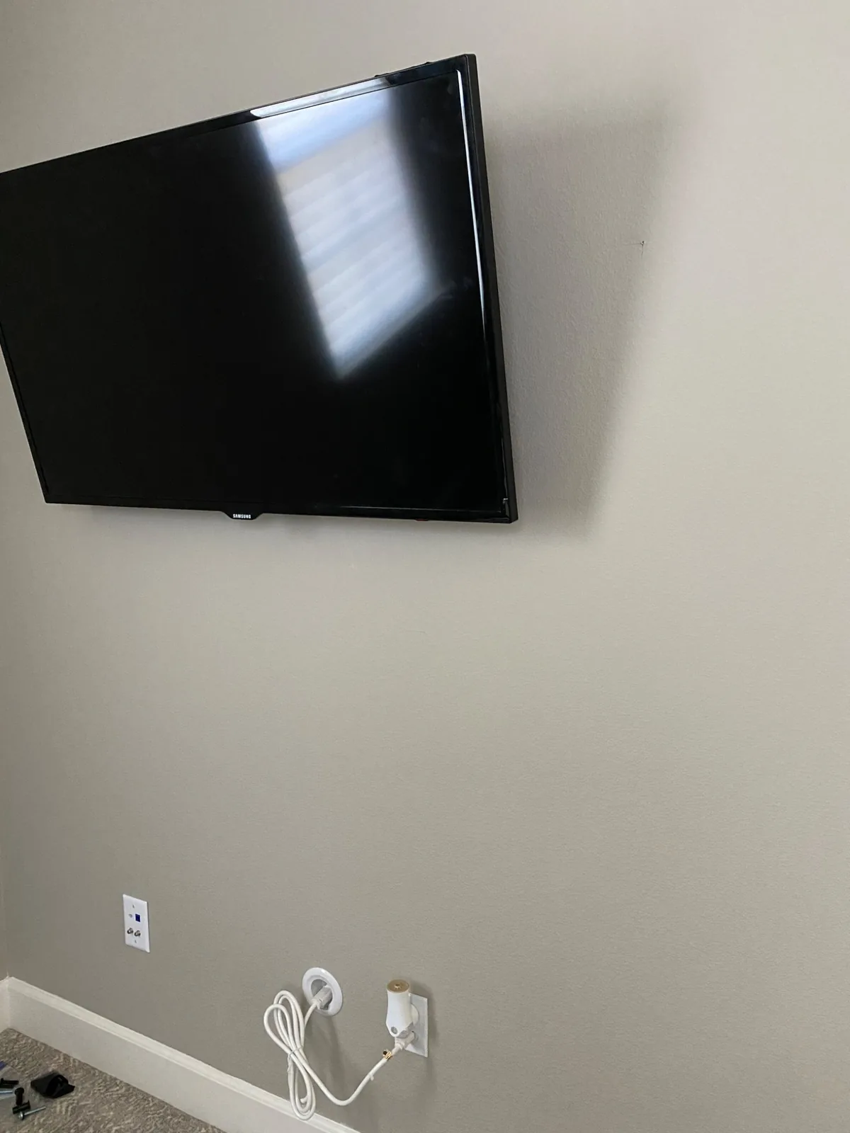 55-inch Samsung TV on full-motion mount with concealed wiring in San Francisco