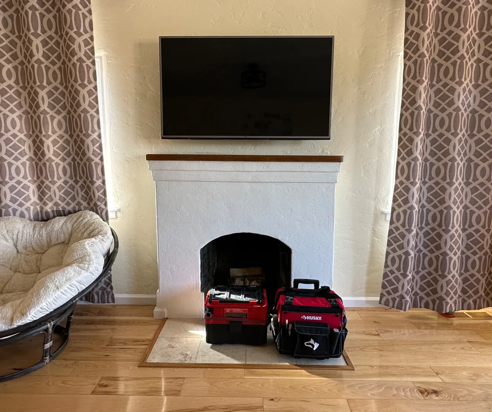 55-inch LG TV mounted over a fireplace in Santa Clara