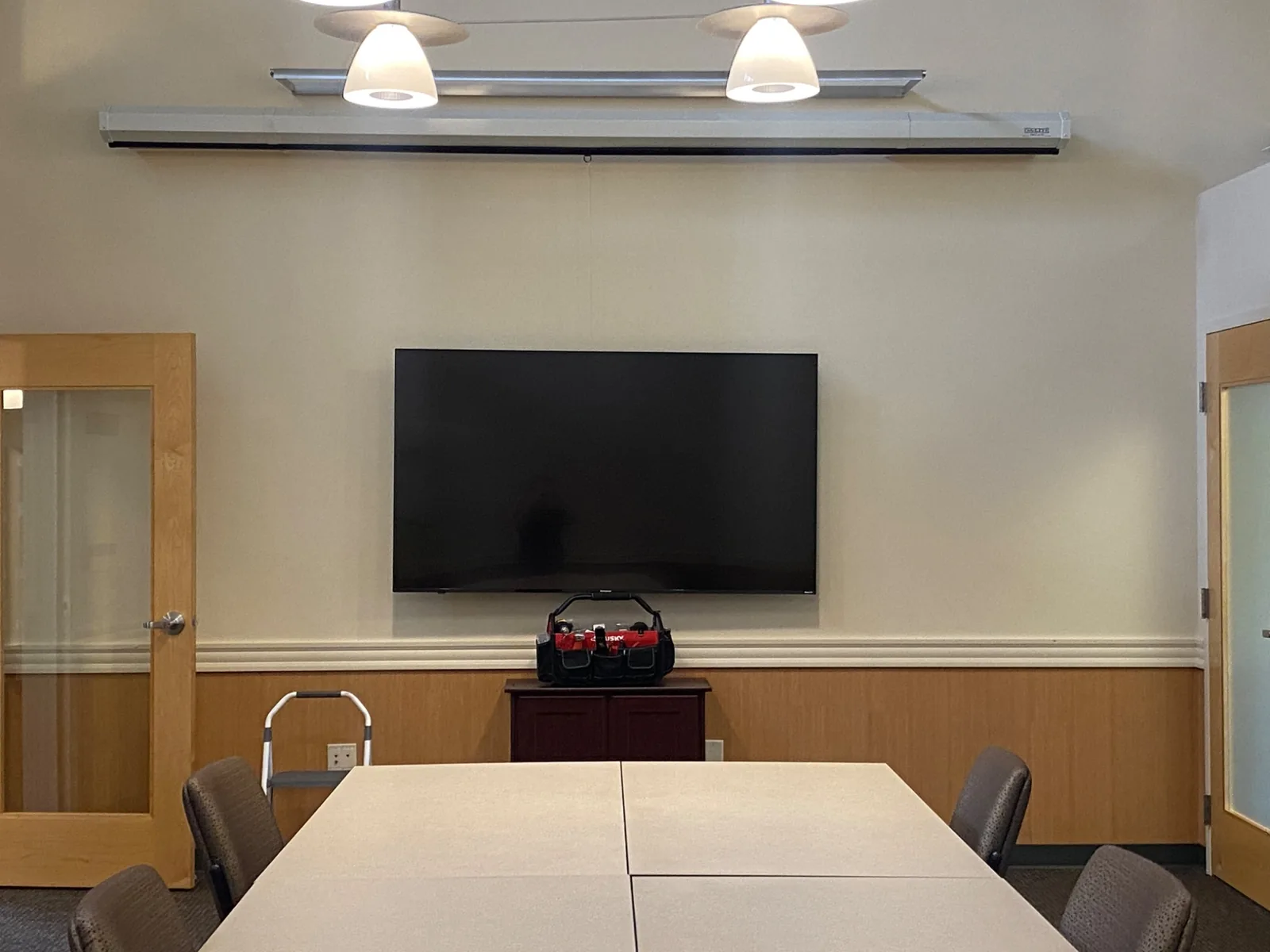 65-inch Samsung TV mounted in a Watsonville conference room