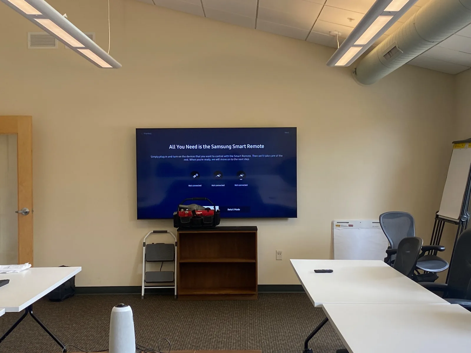 75″ Samsung TV with in-wall cable concealment in a commercial conference-room installation in Watsonville, CA